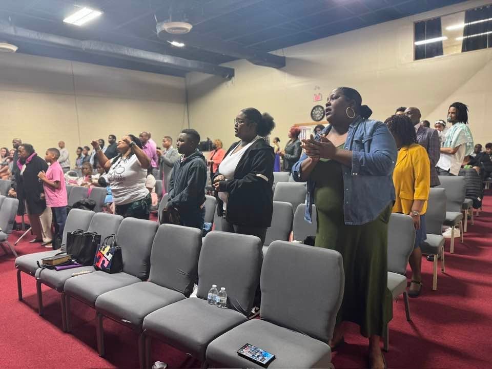 Free Worship congregation standing in worship service
