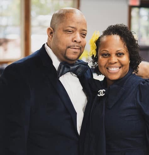 Pastor John and Lady Katina Tillery formal portrait in navy