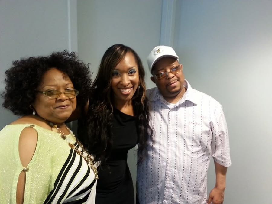 Three people together at a ministry event